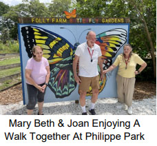 Mary Beth and Joan walking at Philippe Park