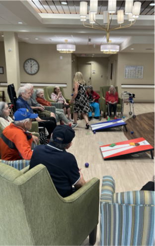 memory care activity cornhole and ring toss