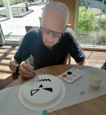 memory care resident painting