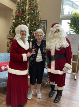 santas and mrs claus at Memory Care Aravilla Clearwater