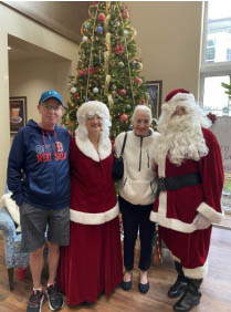 santas helpers at Memory Care Aravilla Clearwater