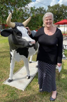 senior with ice cream cow