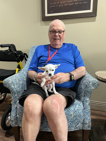 Aravilla Clearwater senior resident with pet