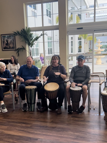 Aravilla Clearwater senior residents at drum circle 2