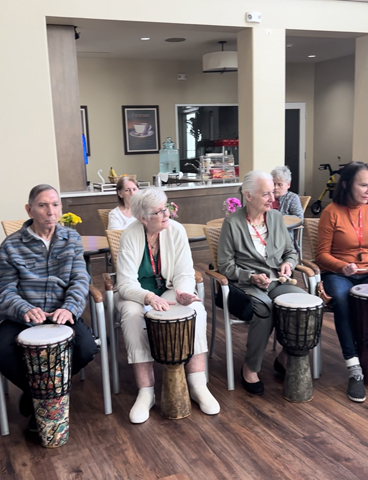 Aravilla Clearwater senior residents at drum circle