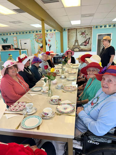 memory care residents tea party