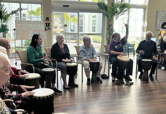 memory care residents drum circle session