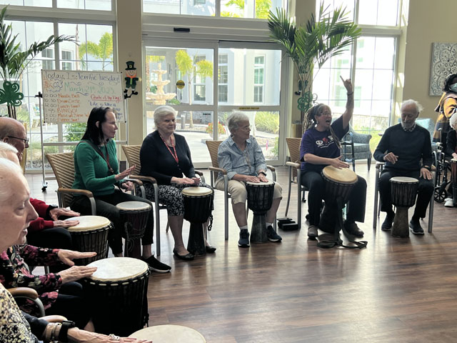 memory care residents drum circle session