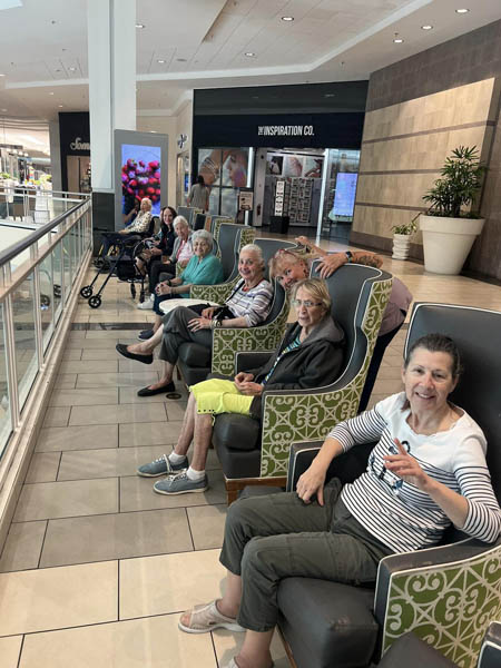 memory care residents watching ice skating