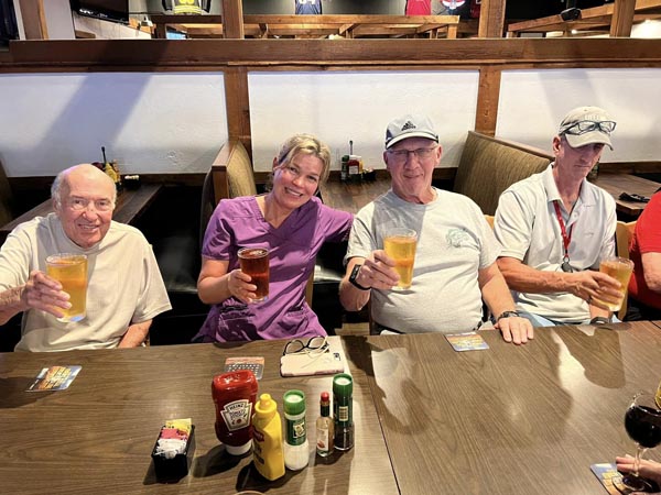 memory care resident peter with friends