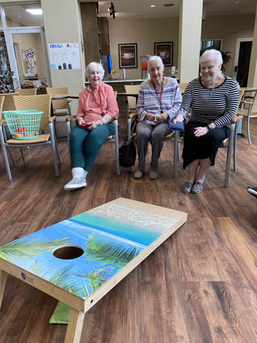 memory care residents enjoying the game