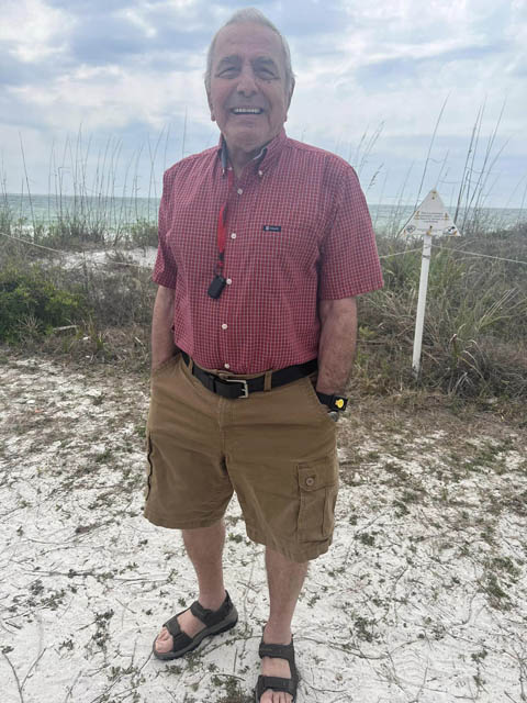 memory care resident Bill at the beach