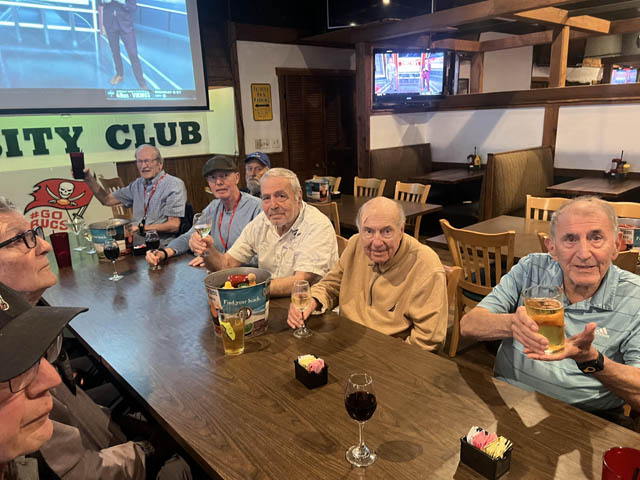 memory care residents enjoying varsity club luncheon