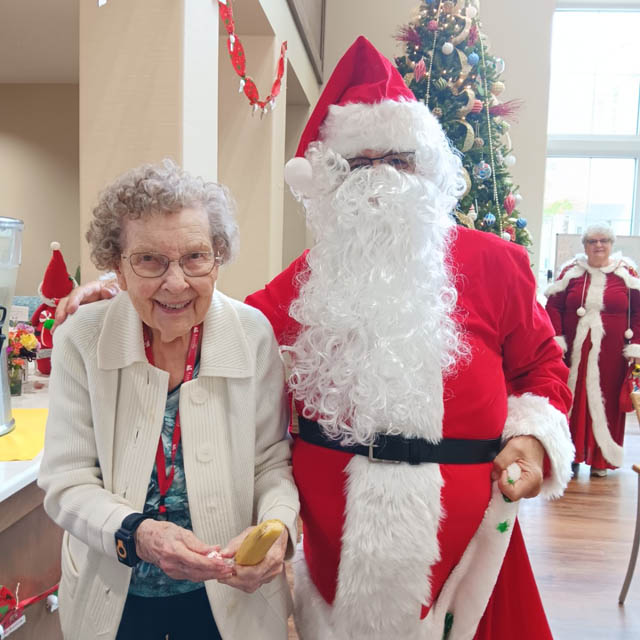 Aravilla Clearwater memory care resident Betty and Santa