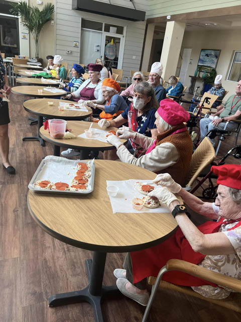 Aravilla Clearwater memory care residents cooking class