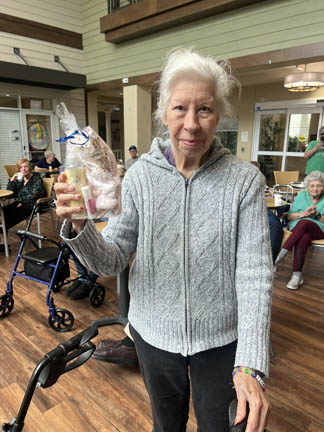memory care resident with her prize