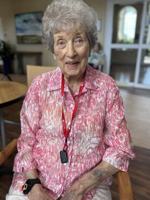 happy memory care resident Aravilla Clewarwater