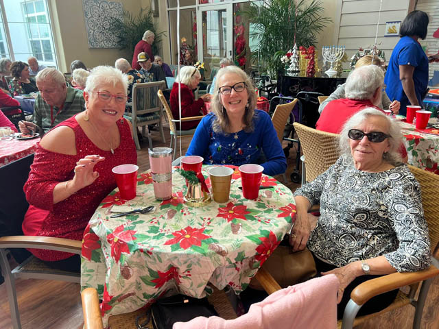 memory care residents, family and friends celebrating