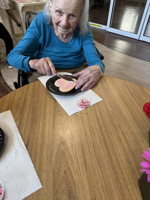 memory care resident enjoying Valentines Day