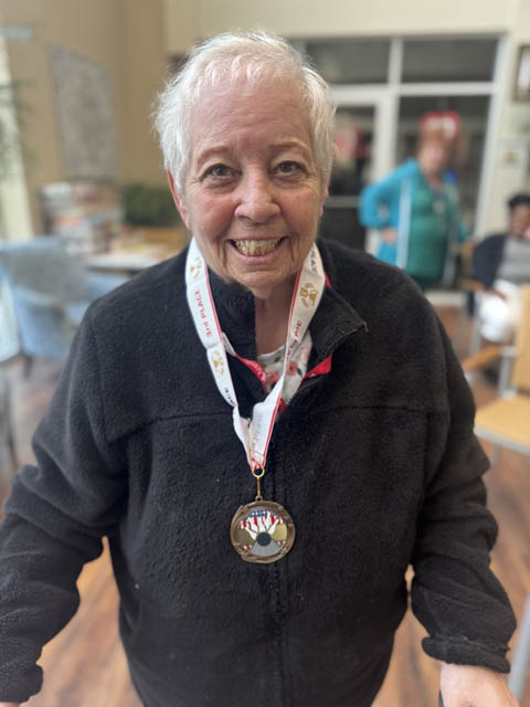 memory care resident proud winner