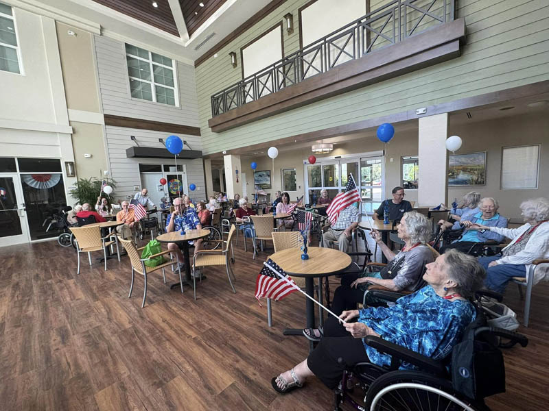 memory care residents celebrating July 4th