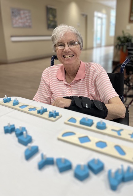 happy memory care resident Debbie