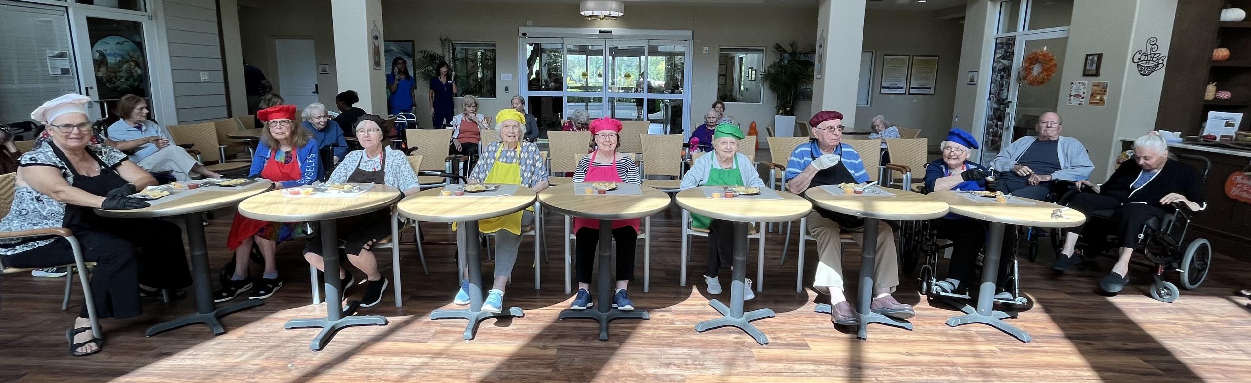 memory care residents having fun in cooking class