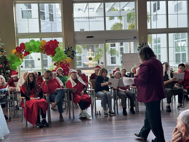 holiday music and festivities at Memory Care Aravilla Clearwater